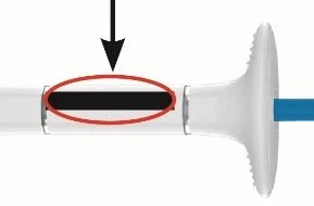 Medical diagram showing a black arrow pointing to a dark horizontal bar enclosed in a red oval on a white device