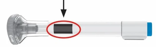 Pen-shaped medical device with a dark rectangular indicator highlighted by a red circle and a black arrow pointing downward