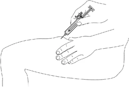 A hand holding a syringe inserting the