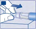 A hand pushes the top part of a cylindrical medical device downward with the thumb onto a flat surface