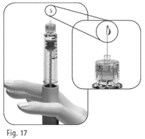 A gloved hand holds a syringe with an enlarged detail showing a drop of liquid emerging from the tip of the