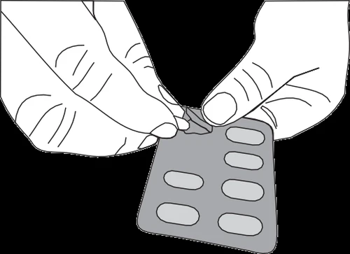 Due mani tengono e preparano un blister grigio contenente sei capsule ovali disposte su due colonne da tre