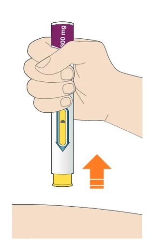 A hand gripping a white injection pen with purple and yellow details above the skin with an orange arrow pointing towards the