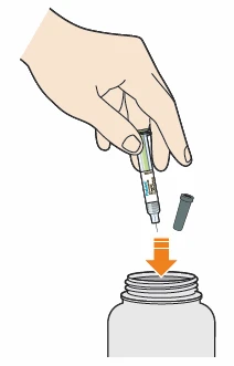 A hand holding an injection pen above the