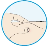 A finger gently pressing on the arm or leg skin indicating the drug application site within a blue circle