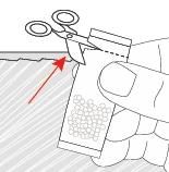 A hand holds a powdered medication sachet while a pair of scissors cuts the top edge indicated by a red arrow