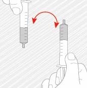A hand rotates a syringe filled with gray liquid from a vertical position to an inverted position following a curved red arrow