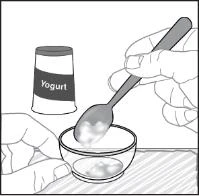 A hand holding a spoon with product over an open yogurt container and a closed jar on a table