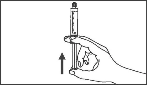 One hand holding a syringe vertically with a black arrow pointing toward the