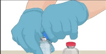 Two hands wearing blue gloves hold a transparent glass vial next to a second vial with a red cap on a light-colored surface