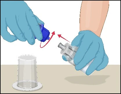 Hands wearing blue gloves rotating a blue cap onto a glass vial next to a beaker