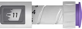 Detail of a syringe with a graduated scale where the indicator points to number 11 on a white and gray background with a purple cap on the right