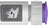 Detail of a medical device with a small digital display showing the numbers 0 and 1 and a