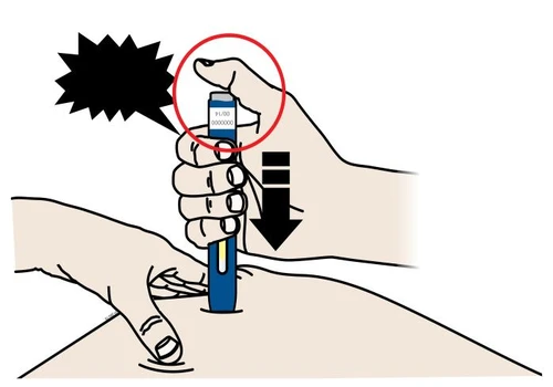 Hand pressing the upper button of a blue injection pen against the skin