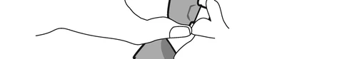 Two hands holding and manipulating a gray cylindrical medical device for preparation or use