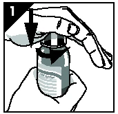 A hand presses down on the cap of a small bottle while the