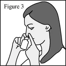 Black and white drawing of a woman holding a small vial close to her nose with both hands to inhale its contents