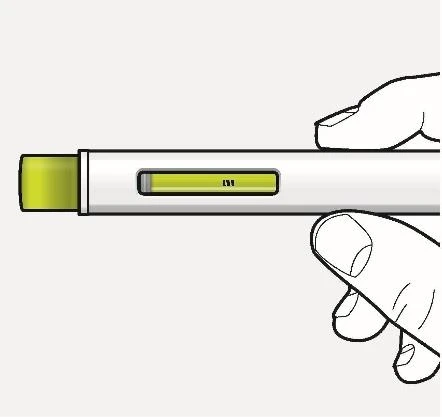 Due mani tengono orizzontalmente un dispositivo medico bianco con una piccola finestra rettangolare che mostra un liquido di colore verde chiaro