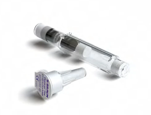 Disposable plastic syringe with white plunger and white protective cap with blue text on white background
