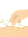 A hand gently pressing a white swab or gauze onto the skin surface of a human body
