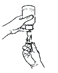 Two hands handling a medicine vial and a syringe to prepare the required dose for injection.