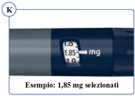 Detail of a medical device with a display showing the selected dose of 1.85 mg next to the label mg and the word 'example' below