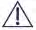 Warning symbol consisting of a black exclamation mark enclosed within