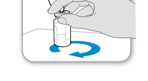 One hand holding a glass vial while a curved blue arrow indicates a clockwise rotational movement on a white surface