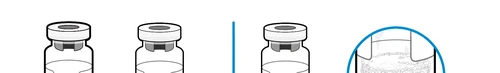 Three medicine vials with gray rubber stoppers and transparent bodies containing liquid inside