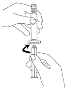 One hand holding a syringe upright while the