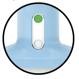 Detail of a blue medical device with a vertical indicator showing a green circle at the top and a white one at the bottom