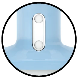 Close-up of a blue medical device with a transparent oval window showing two white spheres