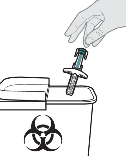 A hand inserts a used syringe into