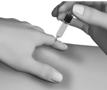 Two hands hold a syringe with a thin needle being inserted under the skin of an arm for an