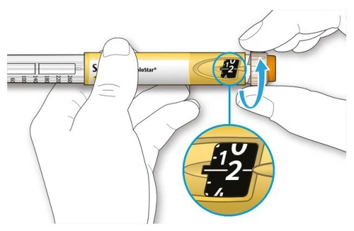 Two hands holding an injection pen with a close-up showing the numerical dose scale set at 12 units