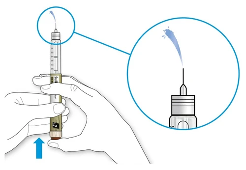 Illustration of hands holding a syringe with a close-up showing a droplet of liquid emerging from the tip