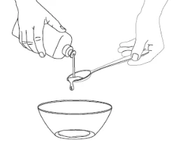 Two hands pouring liquid from a bottle into a spoon above an empty bowl in a black-and-white line drawing