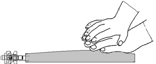 Two hands firmly holding a gray cylindrical medical device with a transparent activation mechanism at the