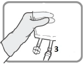 One hand grasping the top of a medical device with two small tubes connected at the base labeled number 3