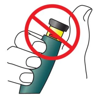 Stylized drawing of a hand holding a green and yellow medical device with a red prohibition circle overlaid