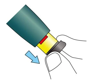 Illustration of a hand holding a green and yellow cylindrical medical device with a blue arrow indicating a downward movement