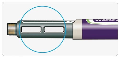 Detail of a medical device with two transparent rectangular windows on a gray cylindrical body, circled in blue