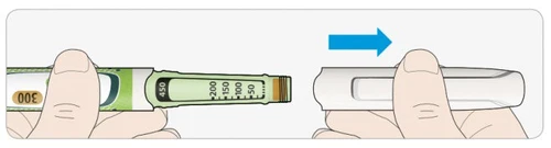 Two hands holding a medical device with a graduated scale and a blue arrow indicating movement to the right for the