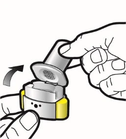 Two hands opening a cylindrical medical device with a snap-on cap revealing an internal circular grid against a white and yellow background