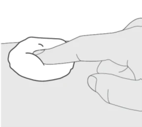 One hand pinches and lifts a skin fold with the other