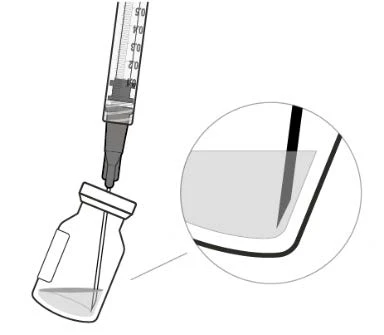 Diagram showing a syringe with needle inserted through the rubber stopper of a glass vial to withdraw the liquid inside