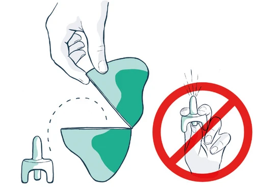 A hand opens a green and blue container while a red circle with a diagonal slash indicates not to press the device with fingers