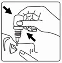 A hand holding a dropper bottle above the