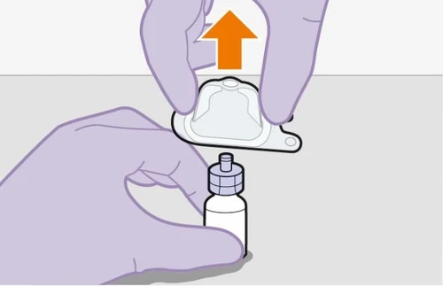 Two hands with purple gloves lifting a transparent protective cap from a white medicine vial with gray stopper upward