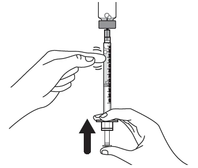 Two hands holding a vertical syringe with a black arrow pointing downward